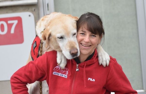 Pig roast in Breslau helps fund Partners with Paws