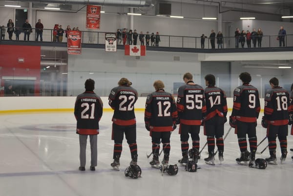 After hoisting banner in new arena, Jacks come back to post a win
