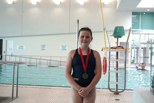 Woolwich swimmers make multiple trips to the podium
