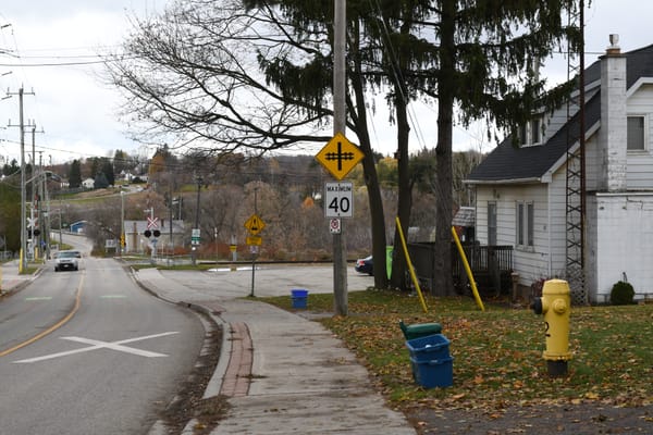 Woolwich makes some concessions, Breslau neighbours must still pay $14K