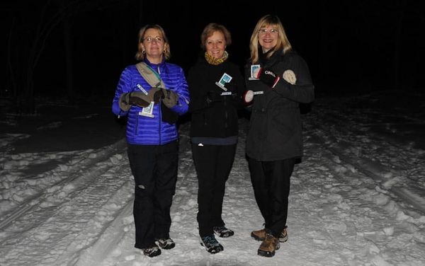Woolwich trails group hosts first night hike, presents badges