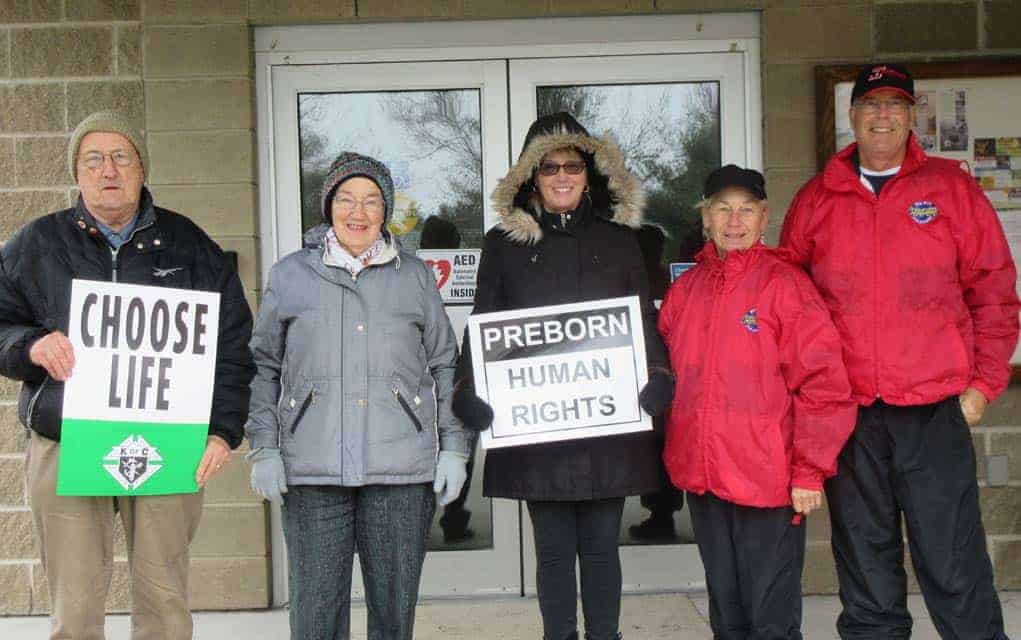 Six brave the weather for walkathon