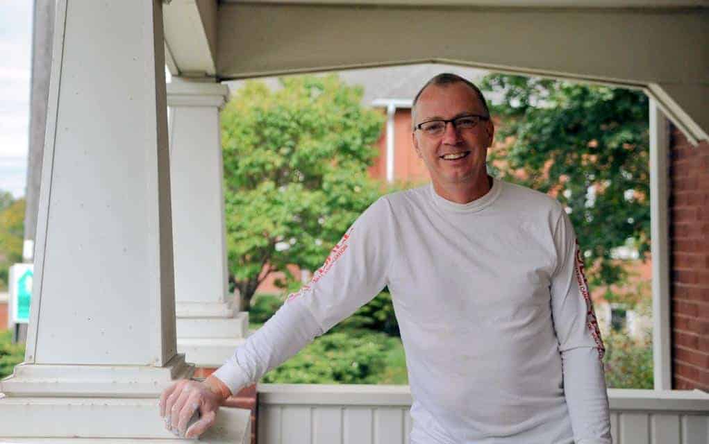 Dan Driedger, executive director of MennoHomes, is among those renovating the old home for its new tenants.
