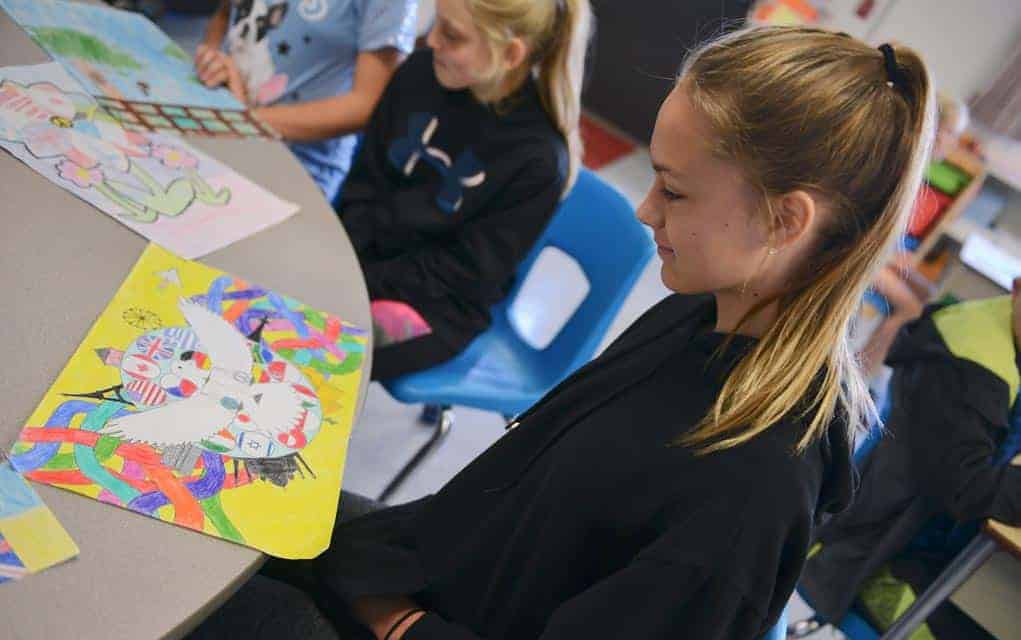 Student art gives visual representation of a peaceful future for Lions Club poster contest