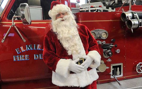 Santa Claus will riding on a fire engine at this Saturday’s parade in Elmira. Following that, he will be making appearances t