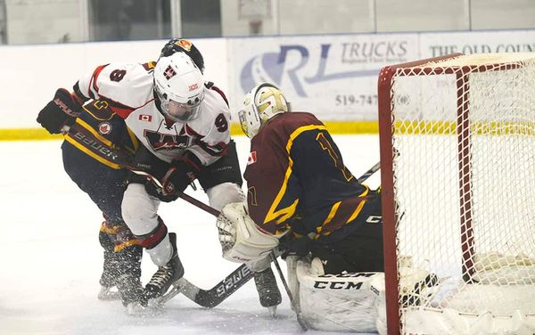 On the road, Wellesley Applejacks split a pair