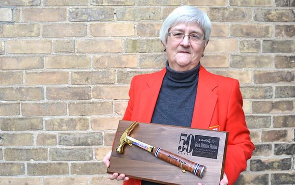 A golden hammer rather than a handshake as she heads into retirement