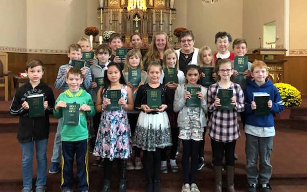 Grade 4 students receive their bibles
