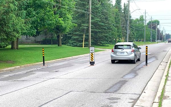 Theft of bollards may be a comment on Oriole Parkway traffic-calming measures