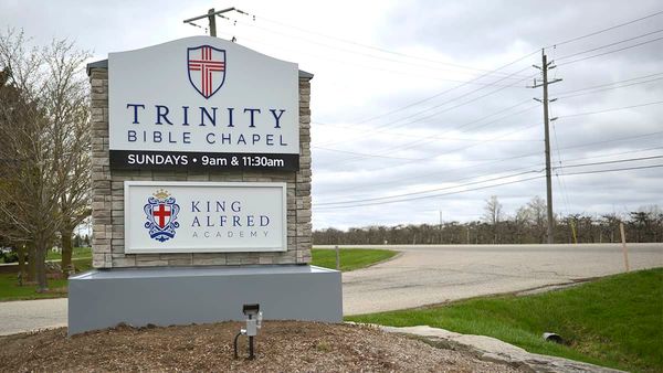 Police issue tickets as people continue to gather at Trinity Bible Chapel