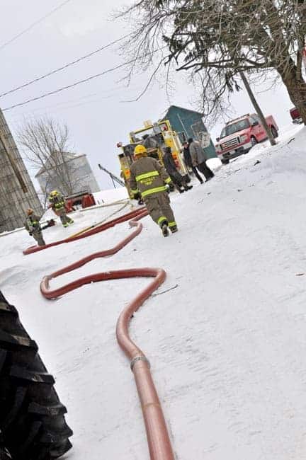 Five tankers were called to a Linwood-area barn fire on Monday, where water supply and the weather posed significant concerns. [Elena Maystruk / The Observer]