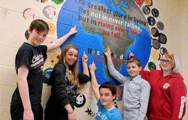 Park Manor Grade 7 students started the project when asked to create something inspiring. From left, Justin Taylor, Morgan Hanley, Seth Morrison, Nate Maier, Hailey Gore. [Will Sloan / The Observer}