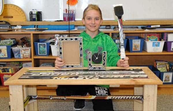 Liam Eveleigh, who converted old hockey sticks and lumber into a variety of products, was the winner of a Grade 5 class project based on the Dragons Den show.[Scott Barber / The Observer]