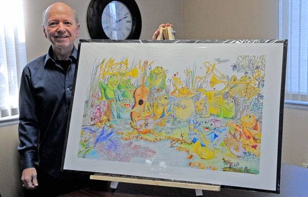 Community Care Concepts president Dan Holt donated a print of his water colour painting “Bull Frog Valley Ensemble” for the fundraiser event on March 24 at the Waterloo Inn. [Scott Barber / The Observer]