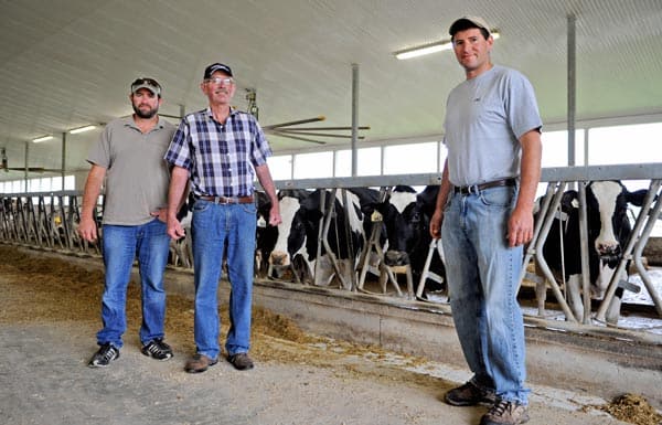Phil, Ralph and Ryan Martin are all part of the Waterloo Holstein Breeders, who will be celebrating the club’s 100 year anniversary on July 4 at an Elmira farm, with historical displays, food, and children’s entertainment.[Whitney Neilson / The Observer]