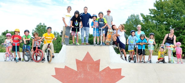 Brady Mayhew (centre) is hosting Skate for Heart at the Elmira Skate Park at First and Centre Streets beginning at 10 a.m. Saturday (July 25) to raise money for Sick Kids Hospital in Toronto. Inset, Thomas Gedja ollies up the steps at the park on a beautiful Tuesday afternoon. [Scott Barber / The Observer]