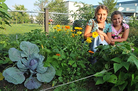 Young gardeners enjoy the fruits of their labour