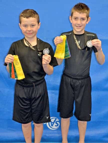 Silver medals for pair of local gymnasts