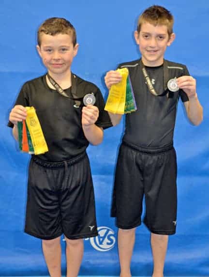                      Silver medals for pair of local gymnasts                             
                     