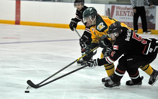 Kings veteran Zac Coulter battles to keep the puck in Listowel’s zone during the Elmira Sugar Kings’ 3-2 preseason loss to the Cyclones Sept. 1 at the WMC. [Scott Barber / The Observer]