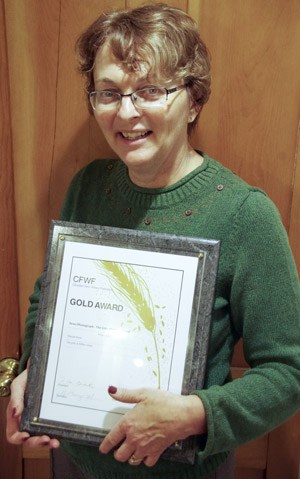 Sharon Grose with her CFWC award in Calgary. [Submitted]