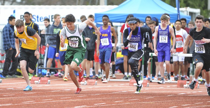 EDSS’ Braxton Holland sprinted to a 10th place finish out of 79 athletes in the junior boys’ 100-metre dash at the annual Track Wars in Cambridge on Apr. 29, where Elmira District Secondary School was one of 49 schools competing. See page 11 for details.[Whitney Neilson / The Observer]