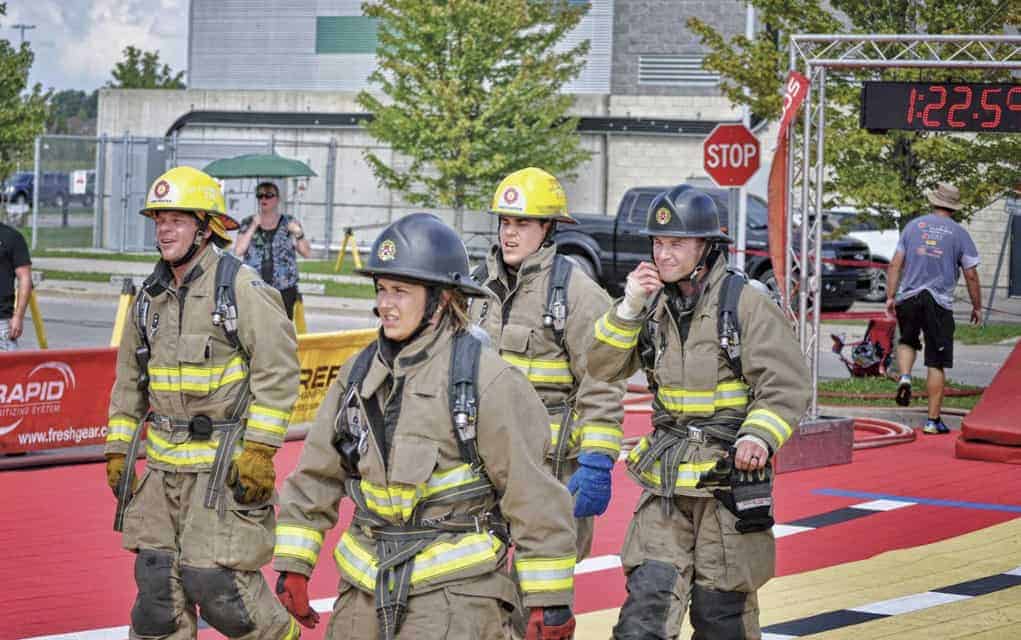 
                     Madison Lavigne from Linwood, along with other Wellesley Township firefighters Clayton Greer, Dave Uberig and Ryan Dosman, pl
                     