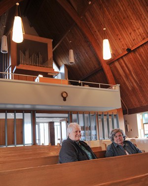 Sheila Schmidt and Marie Scheffelmeier both sit on the anniversary committee for the St. James Evangelical Lutheran Church in St. Jacobs and have strong ties to the church. The congregation is celebrating the church’s 150th anniversary on Oct. 30. [Whitney Neilson / The Observer]