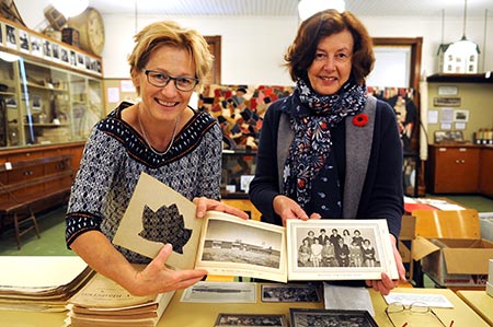 Margit Fritsch and Barb Nowak display some of the artifacts found in the Wellesley Historical Society archives while looking for additions to go in the community cookbook. Wellesley PS is celebrating their 50th anniversary and are on the hunt for recipes to put in the cookbook, celebrating the milestone anniversary for the school building. [Liz Bevan / The Observer]