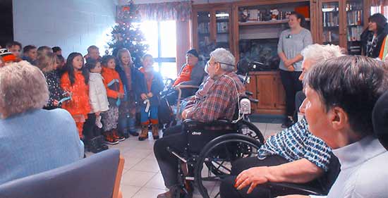                      Christmas songs for Twin Oaks residents                             
                     