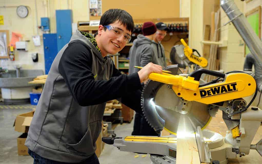 
                     ELAWS student Trenton Martin at woodworking class on Monday. Martin attends school one to two days a week, and has the opport
                     