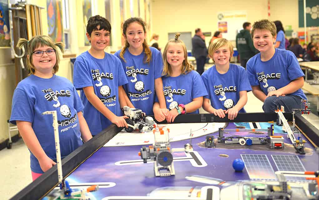 Local youngsters enjoying a hands-on introduction to building robots