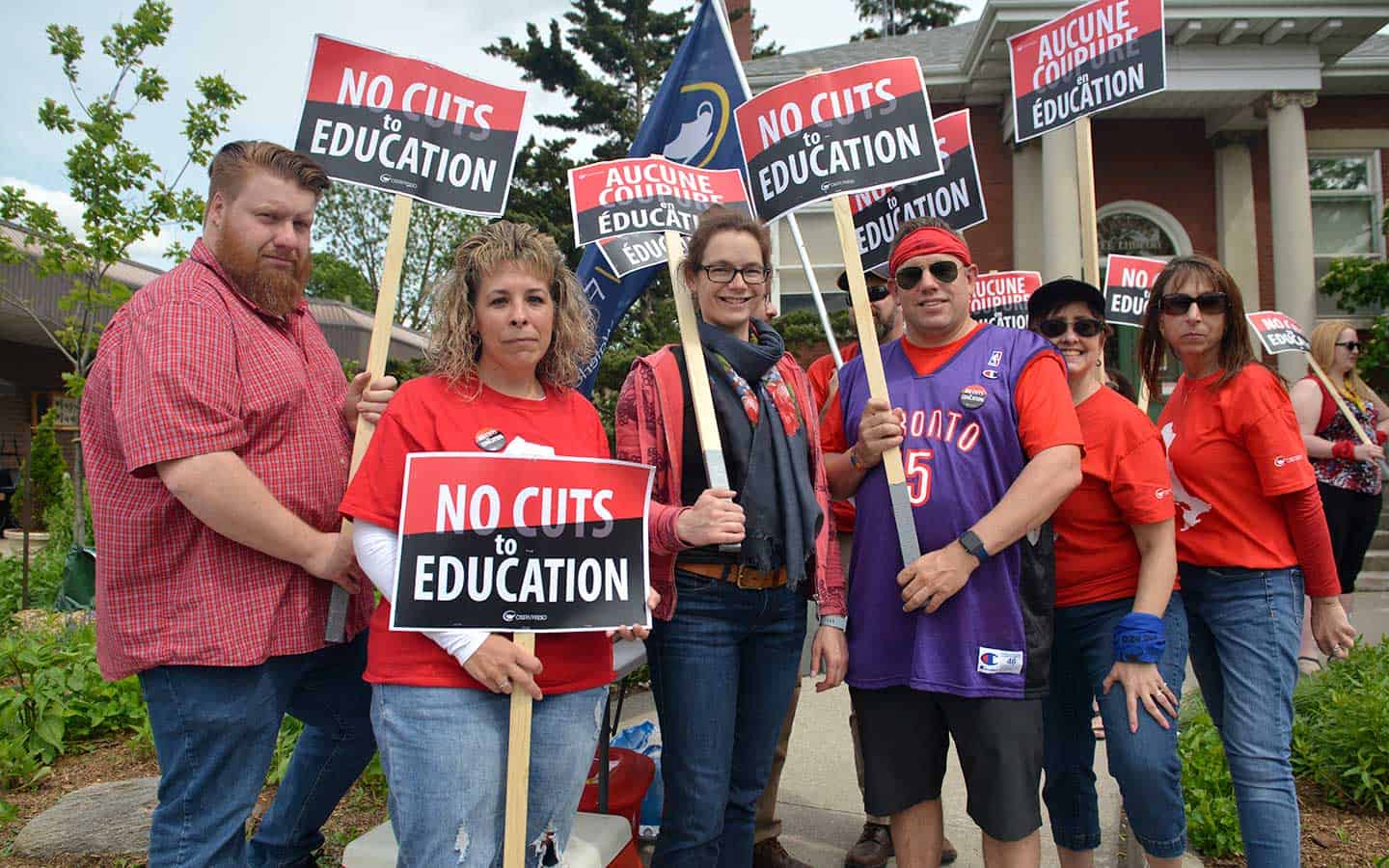 Teachers and supporters rally outside Harris’ office