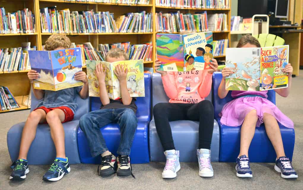 Efforts of Elmira Kiwanis Club help stock the shelves of school libraries